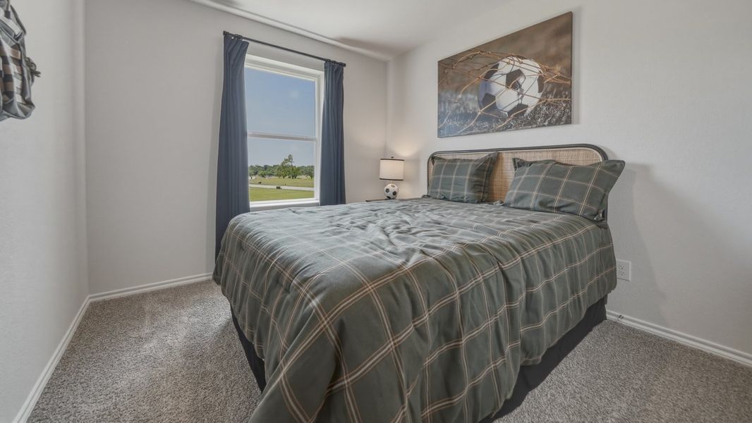 Furnished interior in a model home at Asher Oaks in Bonham (Image 28). Furnished interior in a model home at Asher Oaks in Bonham (Image 28).