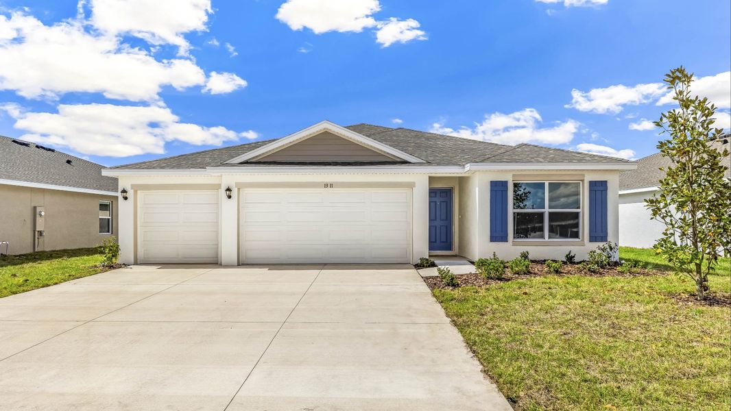 Front exterior of a home in the Oakfield Lakes community, located in Parrish, FL (Image 3).