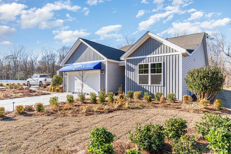 Front exterior of a home in the Ranch Haven community, located in Murrells Inlet, SC (Image 7).