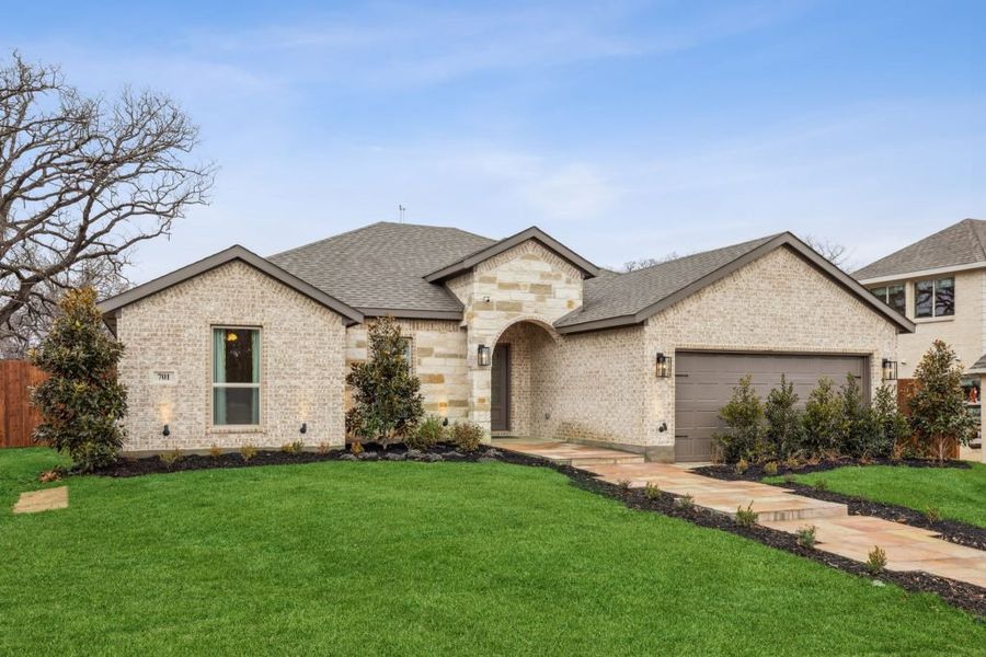 Front exterior of a home in the Stone Eagle community, located in Azle, TX (Image 2).