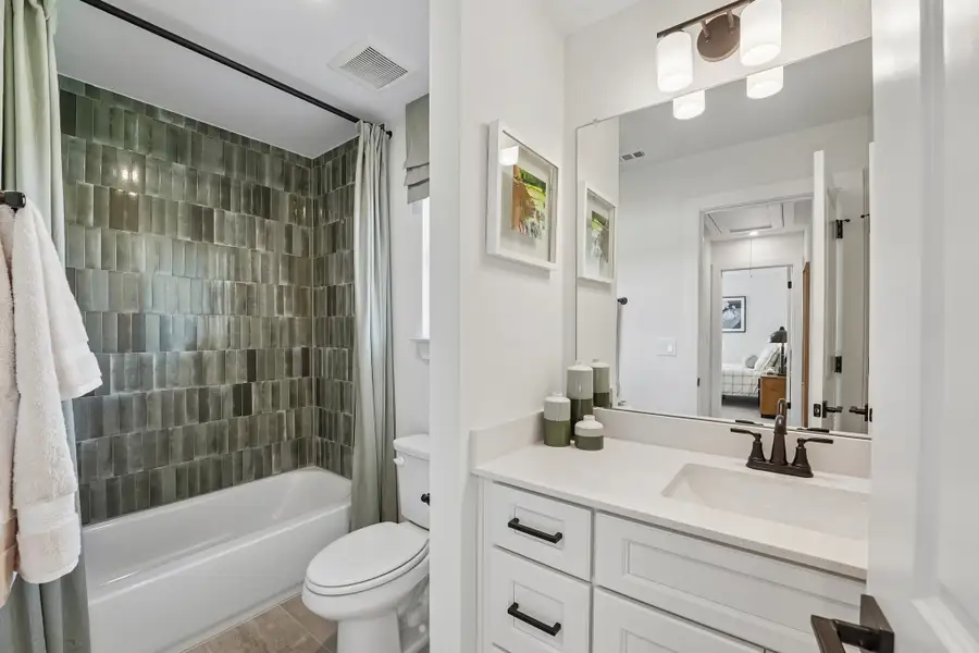 Furnished interior in a model home at Saddle Ridge at Wildhorse Ranch in Manor (Image 38).