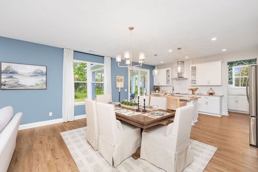 Furnished interior in a model home at Ramsey Landing in Rincon (Image 6).