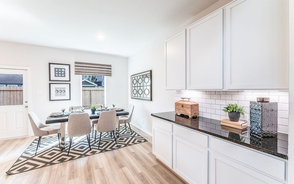 Furnished interior in a model home at Infinity Square in Kyle (Image 5).