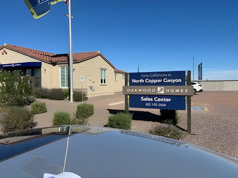A charming beige home with a tiled roof, set in North Copper Canyon by Oakwood Homes Co in Surprise, AZ.