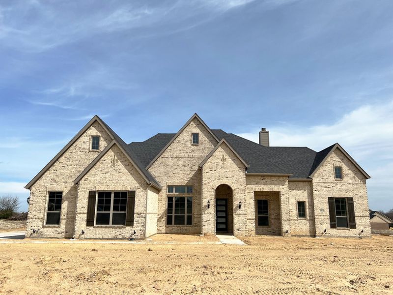 Front exterior of a home in the Oak Creek Ranch - 1 Acre Lots community, located in Midlothian, TX (Image 15).