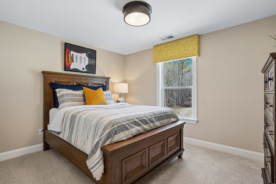 Furnished interior in a model home at Magnolia Acres in Fuquay Varina (Image 23). Furnished interior in a model home at Magnolia Acres in Fuquay Varina (Image 23).