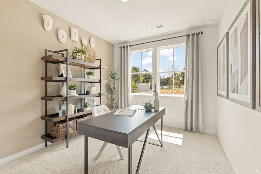 A room with a table and shelves. A room with a table and shelves.