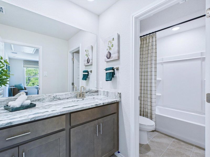 Furnished interior in a model home at Cedar Heights in San Antonio (Image 26).