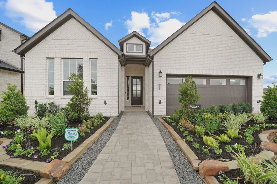 Front exterior of a home in the Mulberry Farms community, located in Santa Fe, TX (Image 1). Front exterior of a home in the Mulberry Farms community, located in Santa Fe, TX (Image 1).