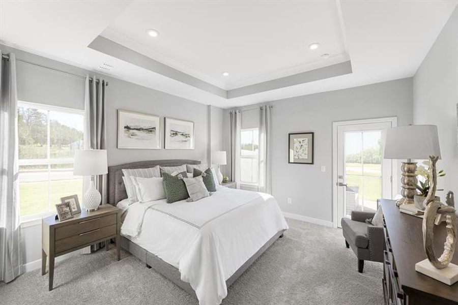 Unwind in a stylish first-floor owner’s suite with a walk‑in closet & private bath. Unwind in a stylish first-floor owner’s suite with a walk‑in closet & private bath.