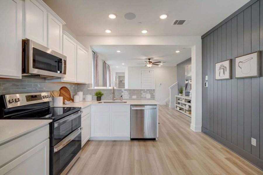Furnished interior in a model home at Avery Centre in Round Rock (Image 34).