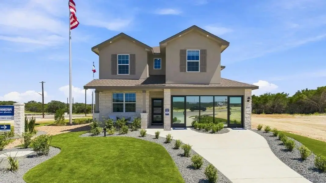 Front exterior of a home in the The Woodlands at Medina Hills community, located in Mico, TX (Image 3).