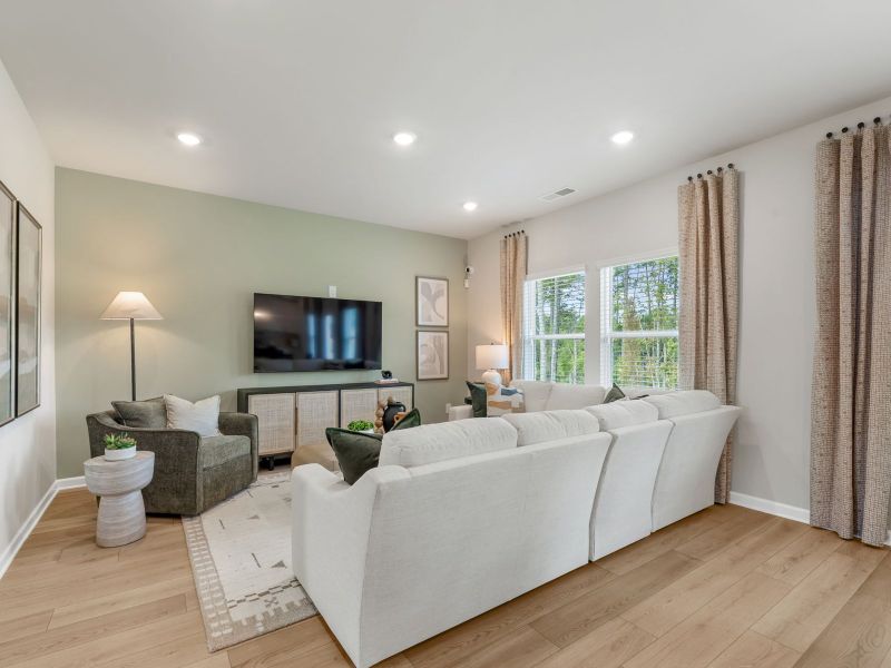 Furnished interior in a model home at Northwoods at Mirror Lake in Villa Rica (Image 8).