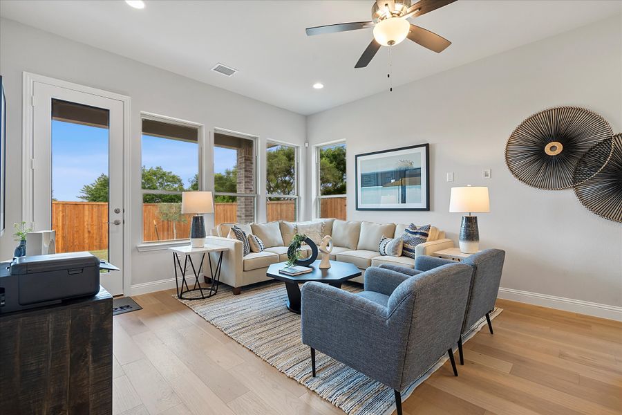 Furnished interior in a model home at Villas at Long Branch in Rowlett (Image 14).