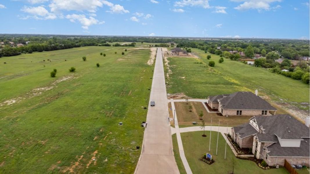 Aerial view of the Crystal Lake Estates community in Red Oak, TX, showing layout and nearby surroundings (Image 8). Aerial view of the Crystal Lake Estates community in Red Oak, TX, showing layout and nearby surroundings (Image 8).