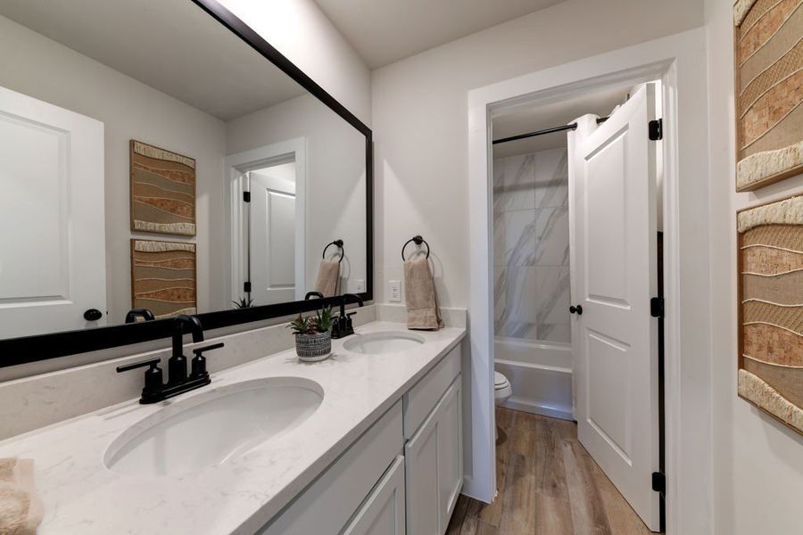 Furnished interior in a model home at Hickory Ridge in Elmendorf (Image 41).
