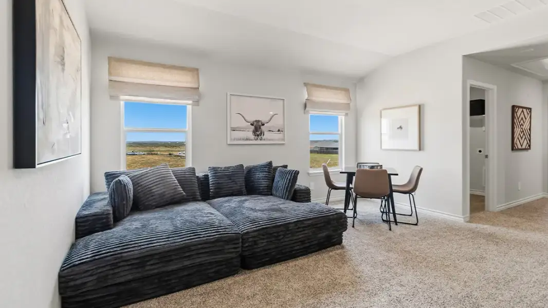 Furnished interior in a model home at Saddle Ridge Estates in Lytle (Image 21).