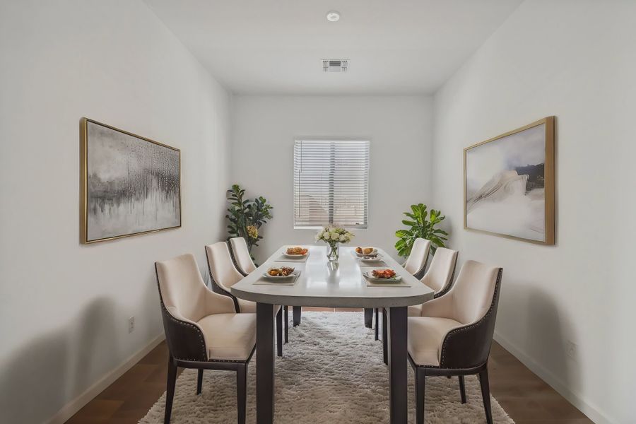 Furnished interior in a model home at Stonebridge Manor in Waddell (Image 8).