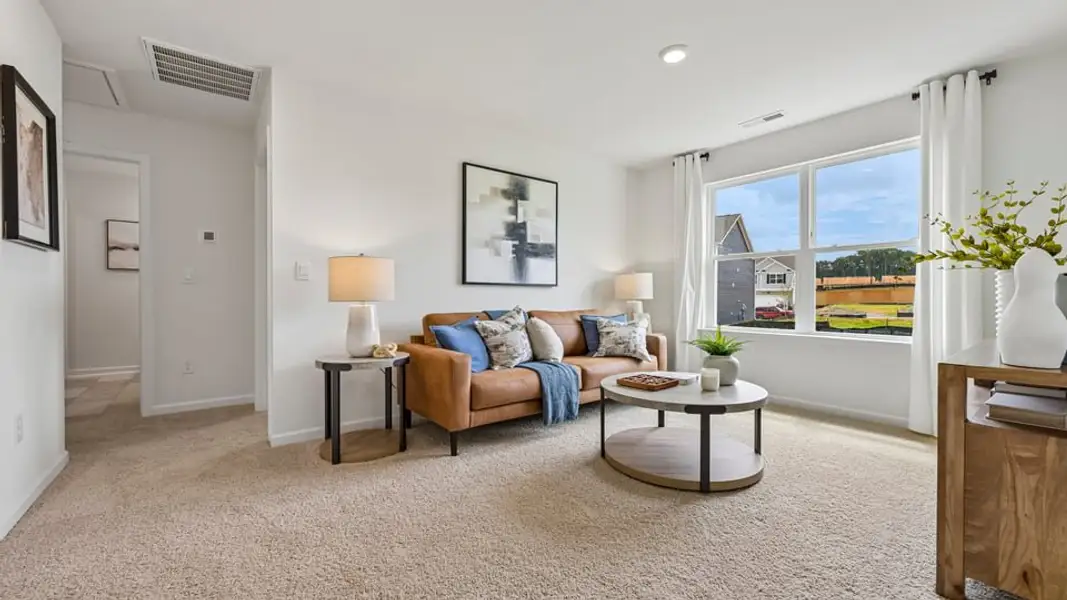 Furnished interior in a model home at Collins Ridge in Hillsborough (Image 34).
