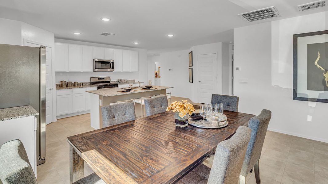Furnished interior in a model home at Senita Crossing in Tucson (Image 24).