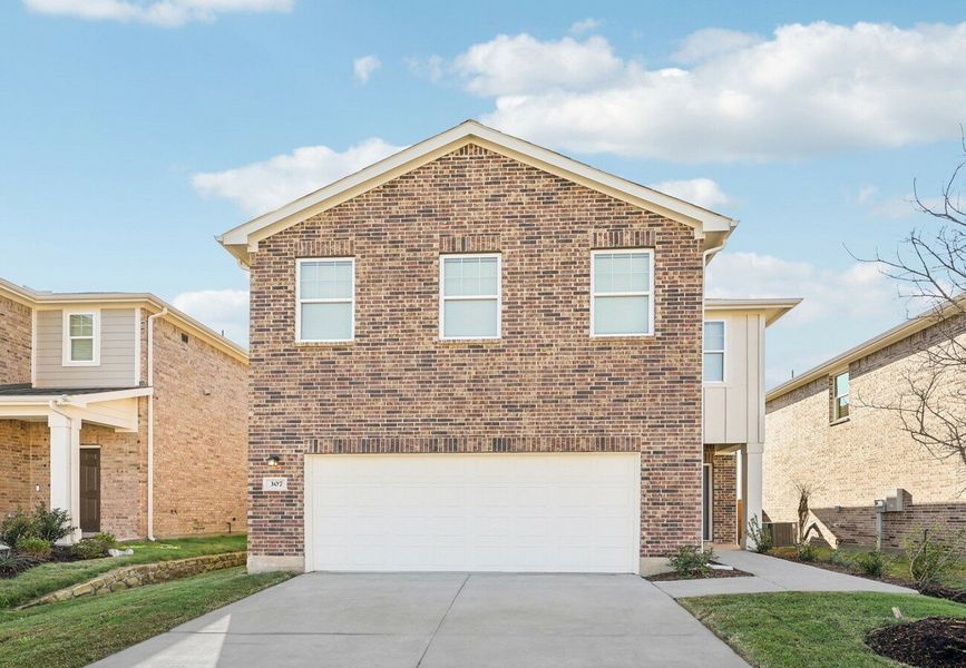 Front exterior of a home in the Chapel Run community, located in Montgomery, TX (Image 2).