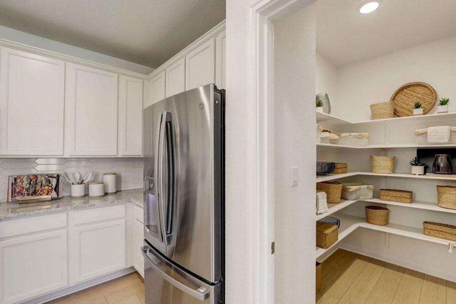 Furnished interior in a model home at Village at Three Oaks in Seguin (Image 12).