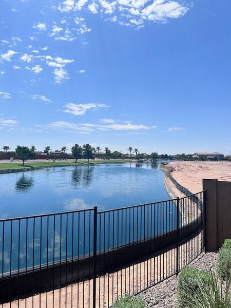 A serene waterfront view in Seasons at Rancho El Dorado IV by Richmond American Homes, Maricopa, AZ.