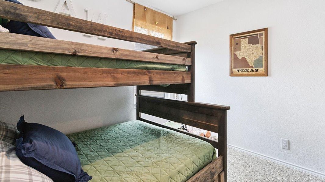 Furnished interior in a model home at Blue Ridge Ranch in San Antonio (Image 24).