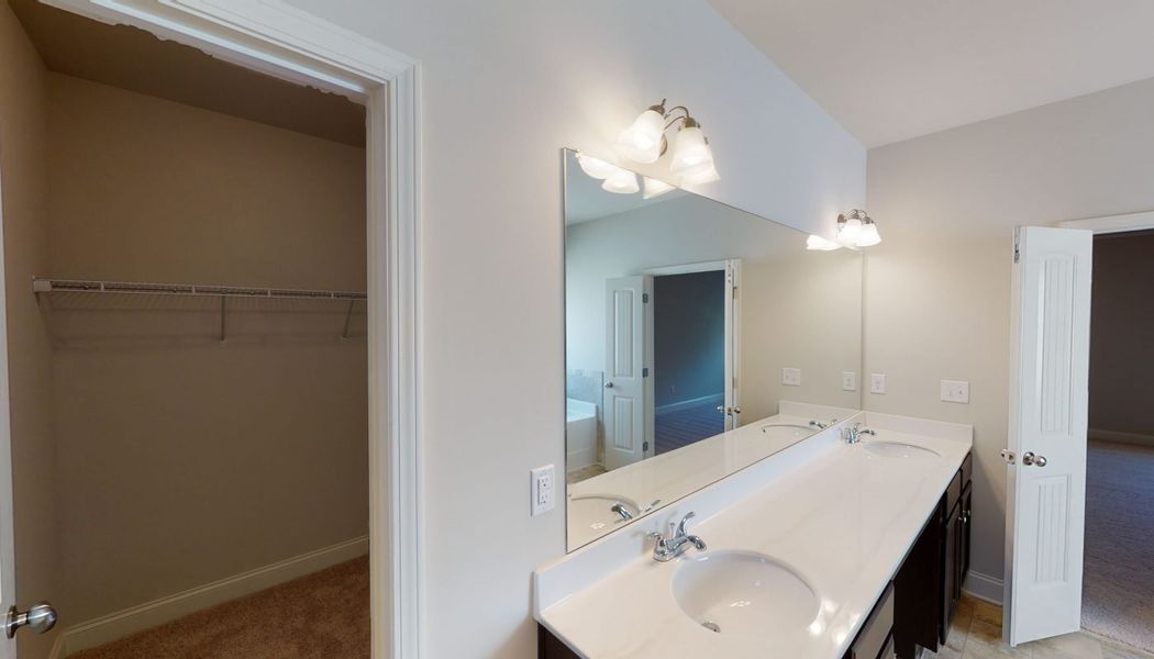 Furnished interior in a model home at Cove Lake Estates in Conley (Image 27).
