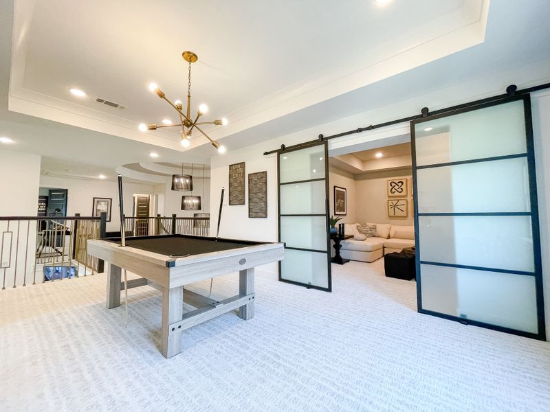 Furnished interior in a model home at Candela – 60' in Richmond (Image 13).