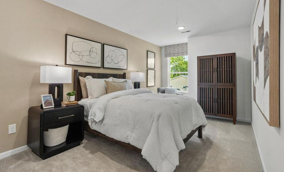 Furnished interior in a model home at CraigStone in Woodruff (Image 11).