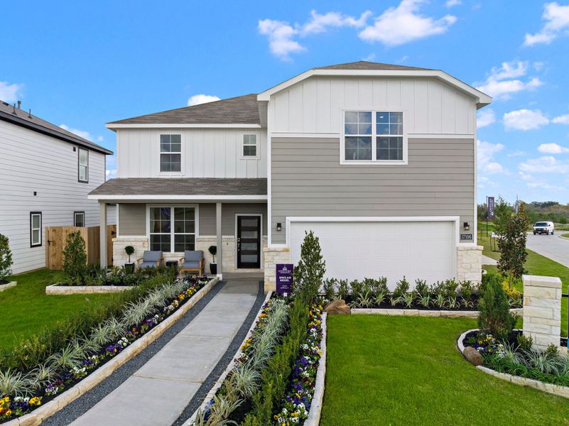 A house with a driveway. A house with a driveway.