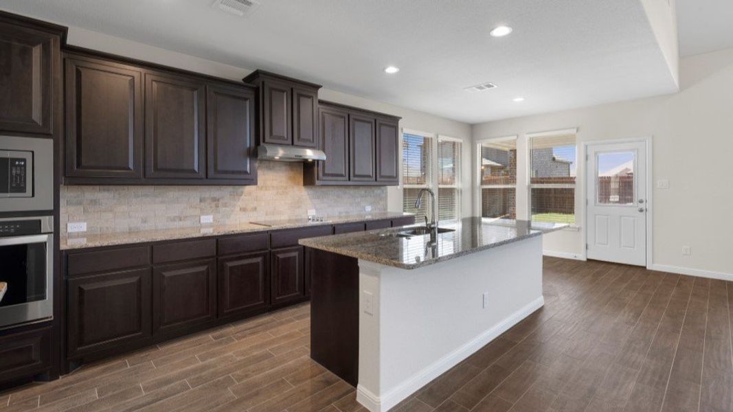 Furnished interior in a model home at Eden Ranch in Arlington (Image 7).