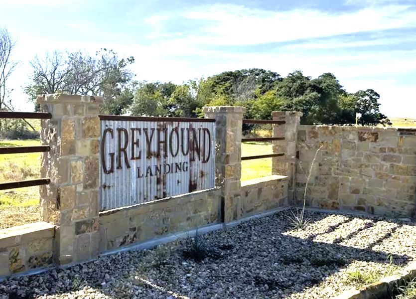 Entrance to the Greyhound Landing community in Weatherford, TX, featuring signage and landscaping (Image 1).
