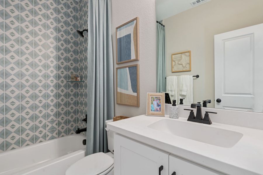 Furnished interior in a model home at Sweetgrass 50s in Haslet (Image 45).