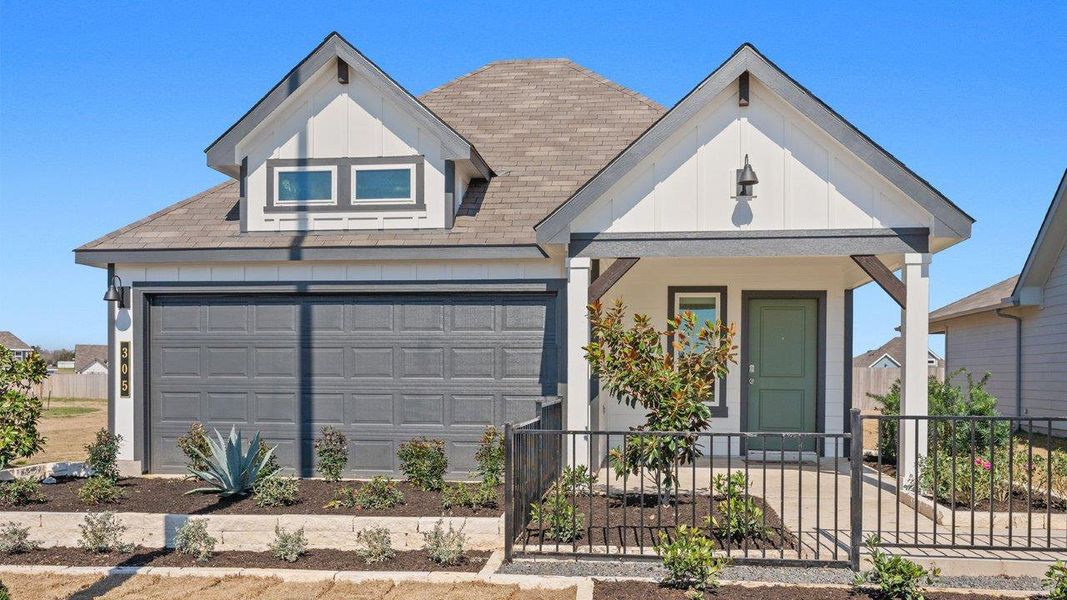 Front exterior of a home in the Cornerstone community, located in Rockdale, TX (Image 2).