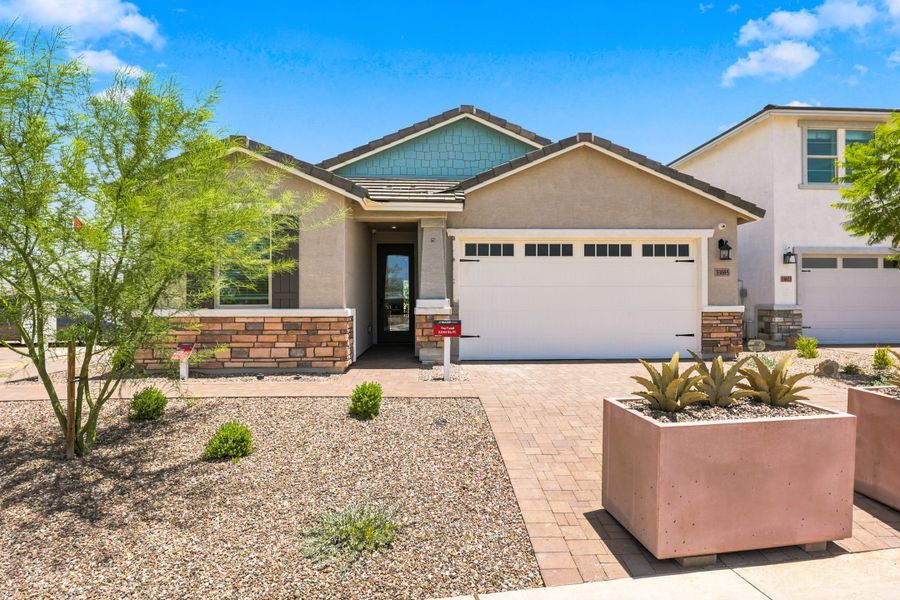 Front exterior of a home in the Willows at Bella Vista Farms community, located in San Tan Valley, AZ (Image 13).