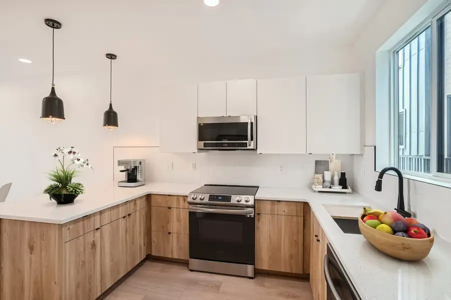 Furnished interior in a model home at Sloan's View Townhomes in Denver (Image 7). Furnished interior in a model home at Sloan's View Townhomes in Denver (Image 7).