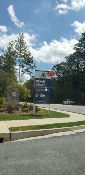 New homes in Briar Creek by Pulte Homes, College Park, GA, from the high $400s, surrounded by lush greenery.