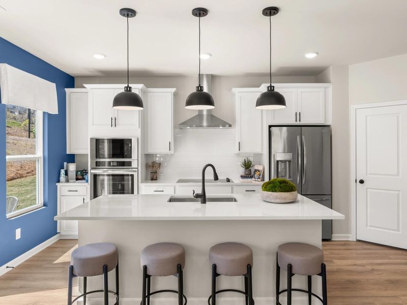 Furnished interior in a model home at The Bluffs in Canton (Image 4).