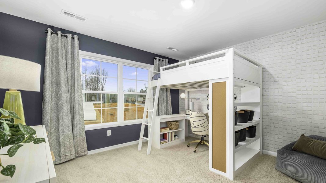 Furnished interior in a model home at Lybrook Village in Bermuda Run (Image 27).