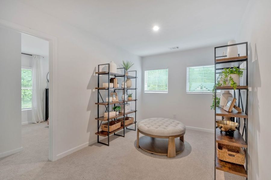 Furnished interior in a model home at Meadow Pines in Dallas (Image 36).