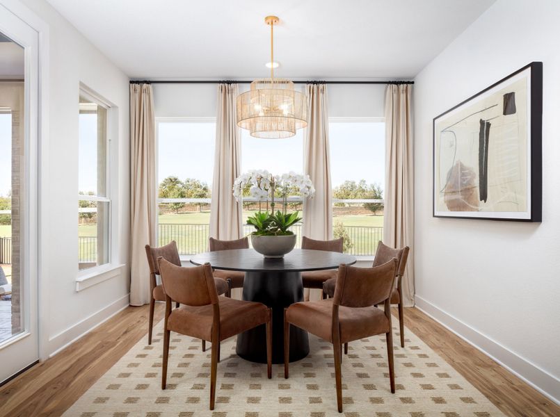 Furnished interior in a model home at Parmer Ranch in Georgetown (Image 34).