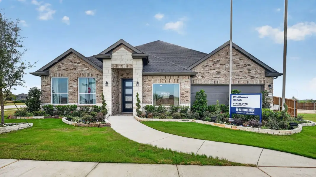 Front exterior of a home in the Wildflower Ranch community, located in Justin, TX (Image 5).