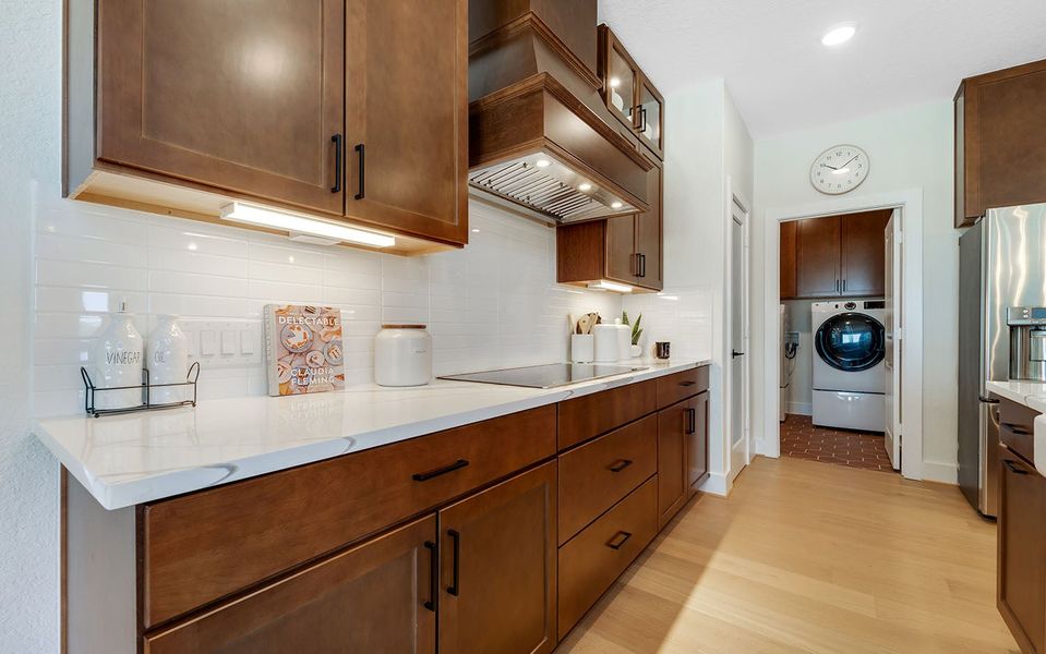 Furnished interior in a model home at The Woodlands at Medina Hills in Mico (Image 16). Furnished interior in a model home at The Woodlands at Medina Hills in Mico (Image 16).