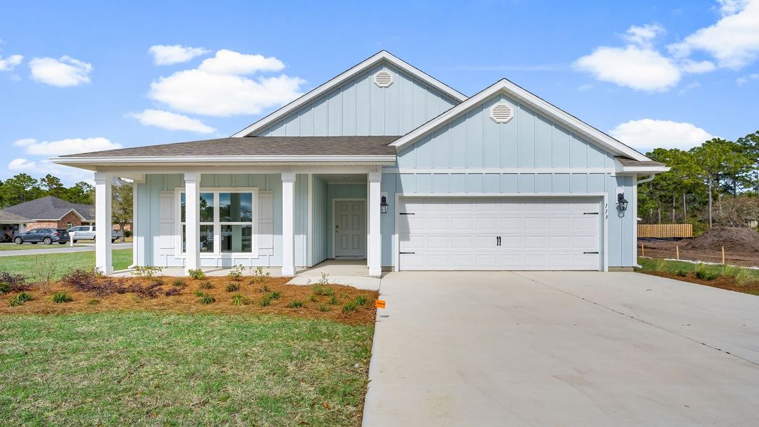Front exterior of a home in the Pine Creek and Heron Walk community, located in Port Saint Joe, FL (Image 10). Front exterior of a home in the Pine Creek and Heron Walk community, located in Port Saint Joe, FL (Image 10).
