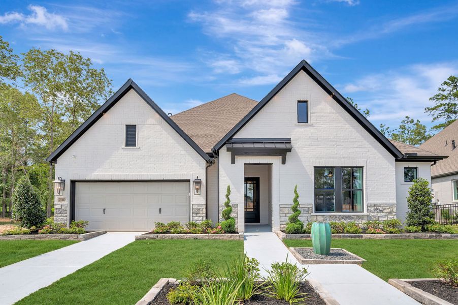 Front exterior of a home in the The Highlands Encore - Harbor Collection community, located in Porter, TX (Image 3). Front exterior of a home in the The Highlands Encore - Harbor Collection community, located in Porter, TX (Image 3).
