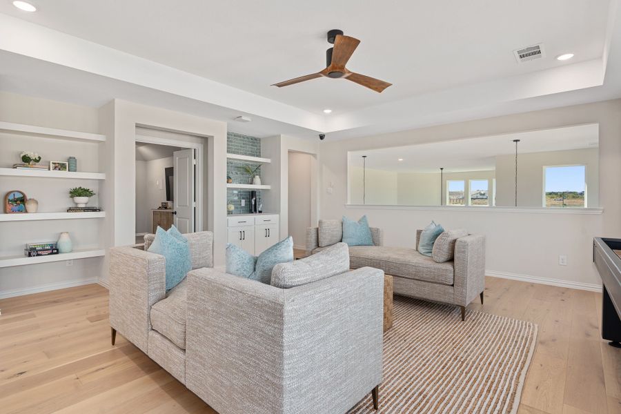 Furnished interior in a model home at Sweetgrass 50s in Haslet (Image 30).
