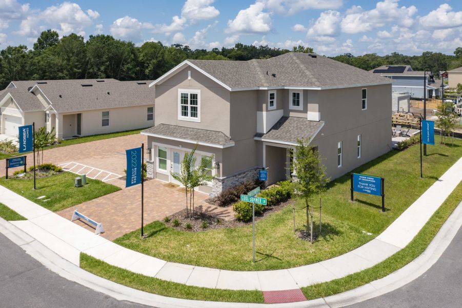 Exterior of a 2-story model home on a corner lot