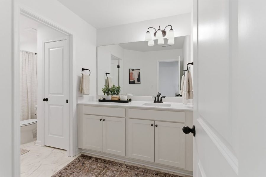 Furnished interior in a model home at Park Center Pointe in Austell (Image 18).